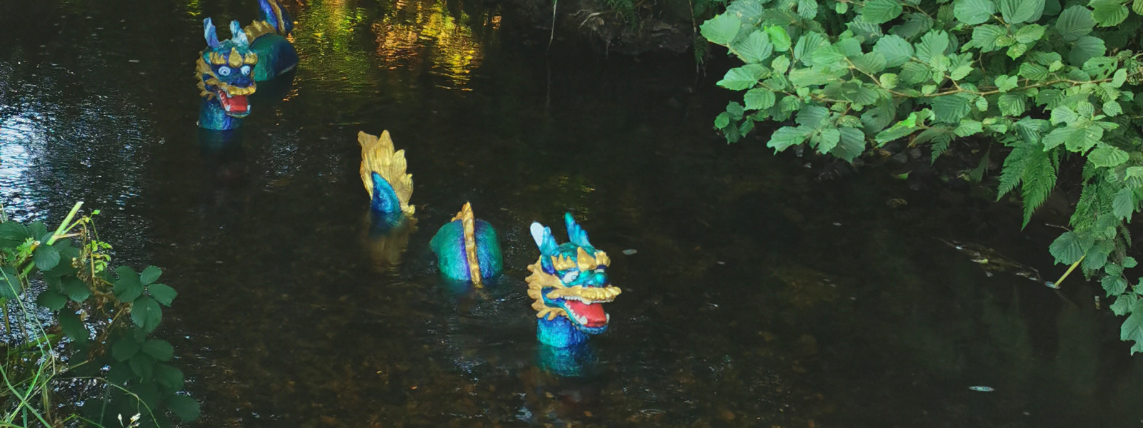 Painted nagas or dragons in a river